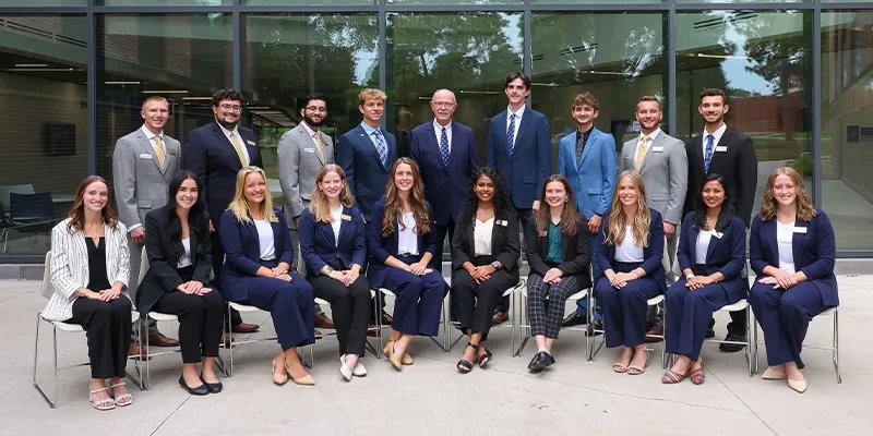 members of the student government pose for a group photo with chancellor kristensen